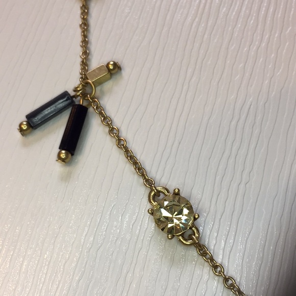 Goldtone long necklace with black accents - Picture 2 of 2